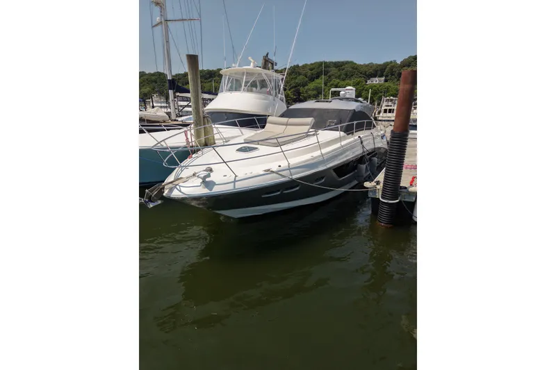 Slide: The Image of 2018 Sea Ray Sundancer 510 yacht docked at marina on a sunny day. - 88