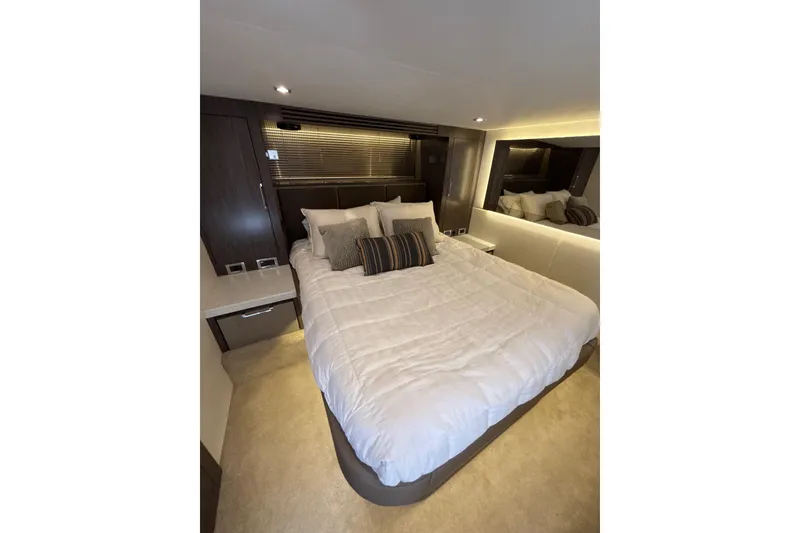 Slide: The Image of Luxurious bedroom interior of 2018 Sea Ray Sundancer 510 yacht with modern decor. - 137
