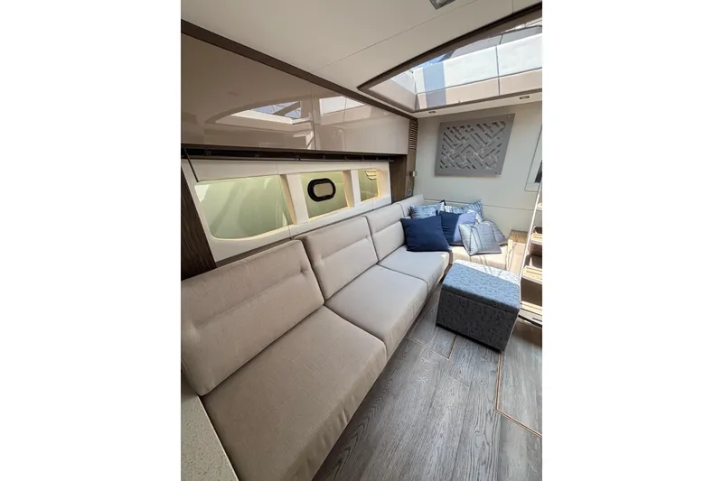 Slide: The Image of Luxurious interior of 2018 Sea Ray Sundancer 510 yacht with plush seating and modern decor. - 129