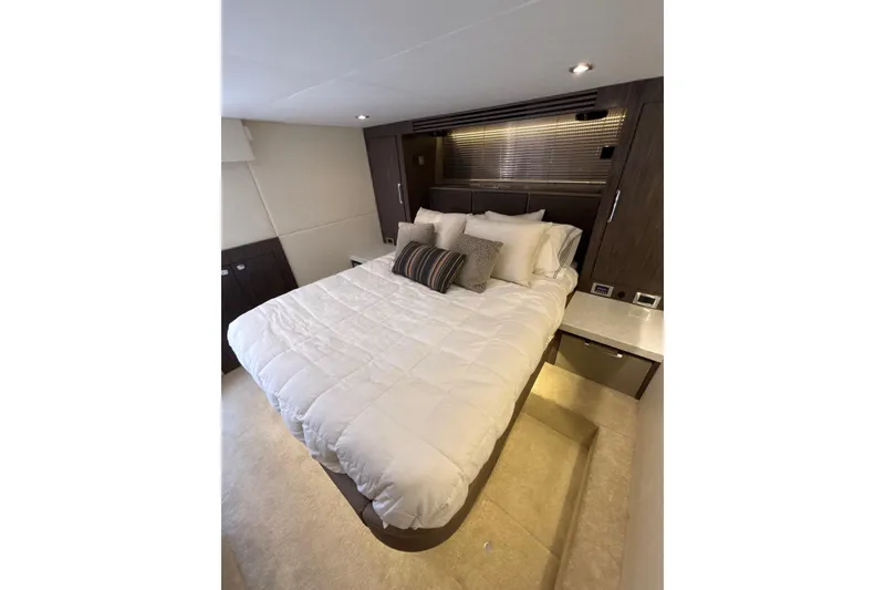 Slide: The Image of Luxurious bedroom interior of 2018 Sea Ray Sundancer 510 yacht with elegant bedding. - 138