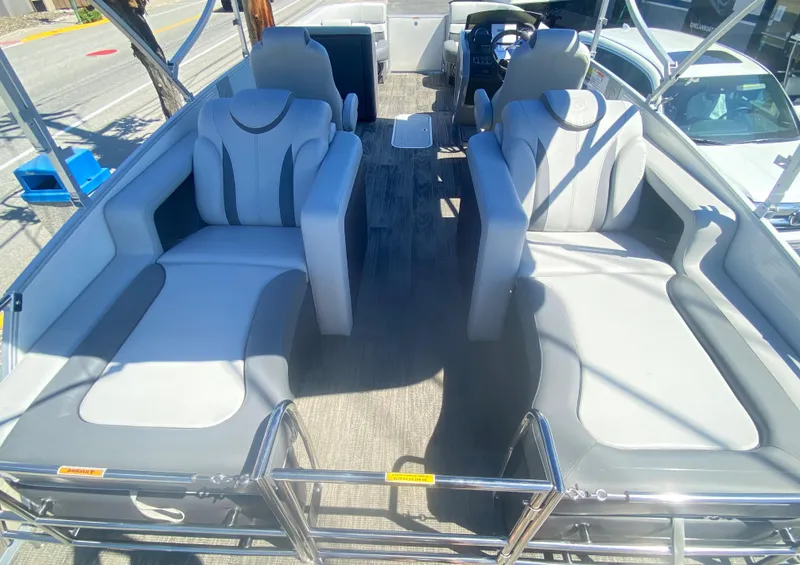 Slide: The Image of 2023 Godfrey Monaco 235 Rear Lounge boat with luxurious seating. - 9