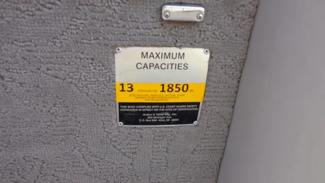 Slide: The Image of 2014 Avalon Wind Jammer maximum capacity label, 13 persons or 1850 lbs. - 12