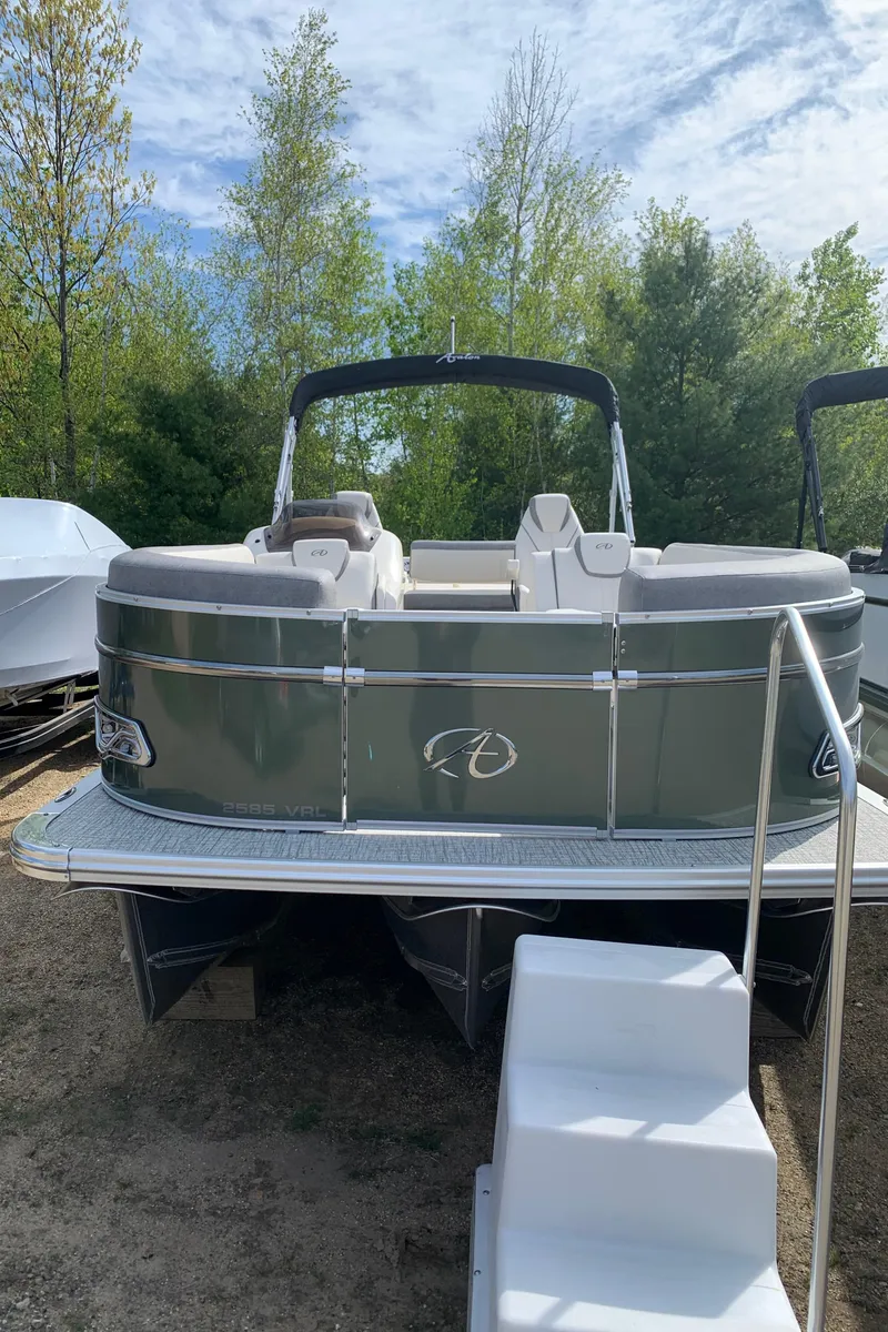 Slide: The Image of 2023 Avalon Catalina VRL 25' Tri-Toon boat in a wooded area. - 11