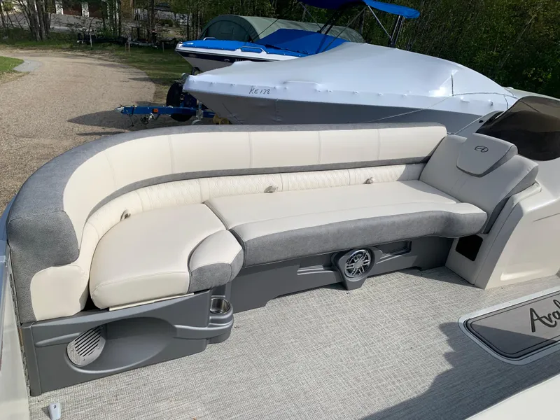 Slide: The Image of 2023 Avalon Catalina VRL 25' Tri-Toon boat with luxurious seating and modern design. - 14
