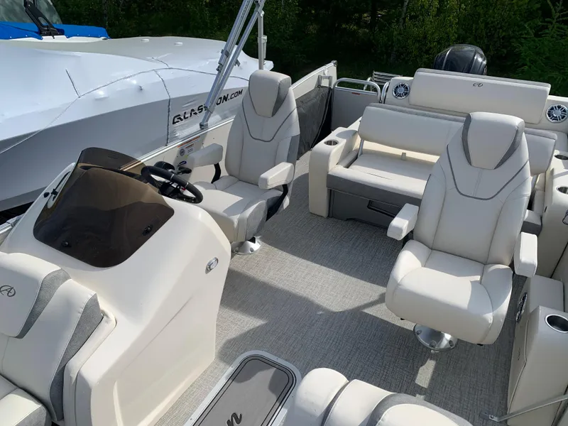 Slide: The Image of 2023 Avalon Catalina VRL 25' Tri-Toon boat interior with luxurious seating. - 28