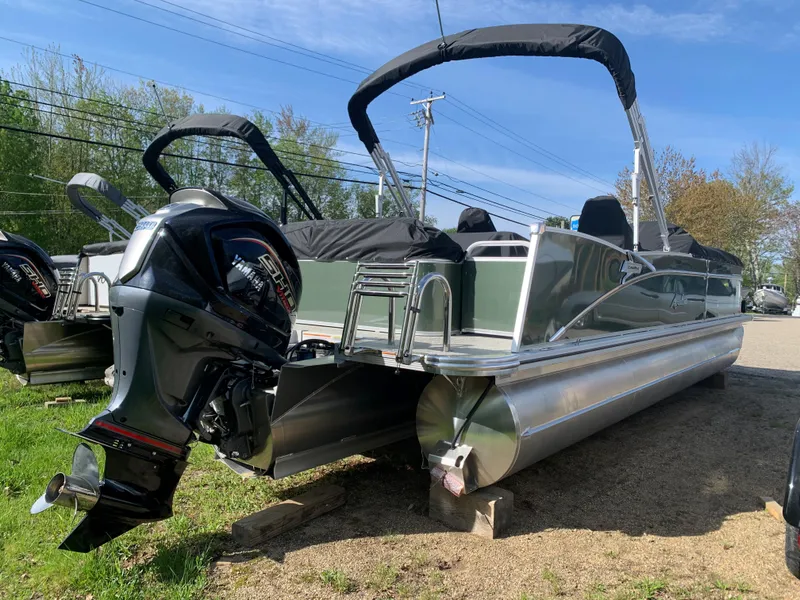 Slide: The Image of 2023 Avalon Catalina VRL 25' Tri-Toon boat with outboard motor. - 3