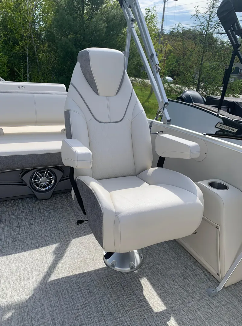 Slide: The Image of 2023 Avalon Catalina VRL 25' Tri-Toon captain's chair with armrests and modern design. - 38