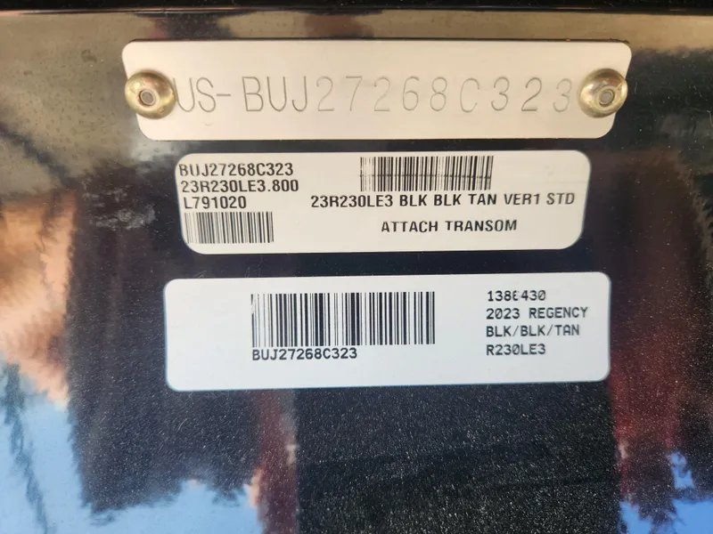 Slide: The Image of 2023 Regency 230 LE3 boat identification labels and barcodes. - 16