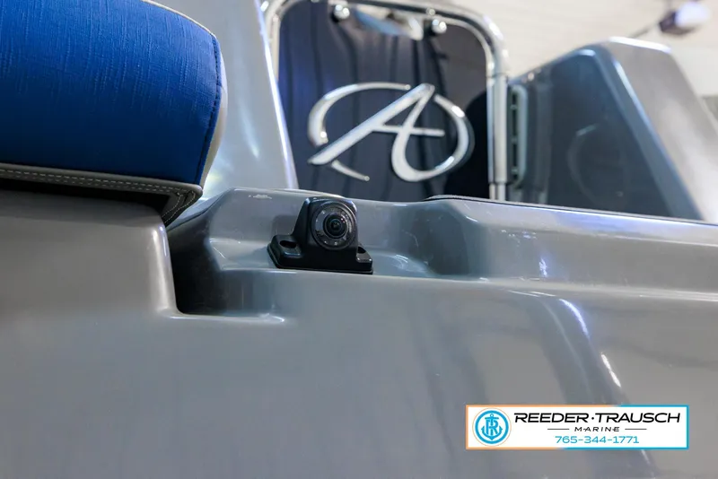 Slide: The Image of 2023 Avalon Waketoon boat with rear camera, Reeder Trausch Marine logo. - 41