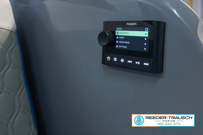 Slide: The Image of 2023 Avalon Waketoon boat audio control panel by Fusion. - 42
