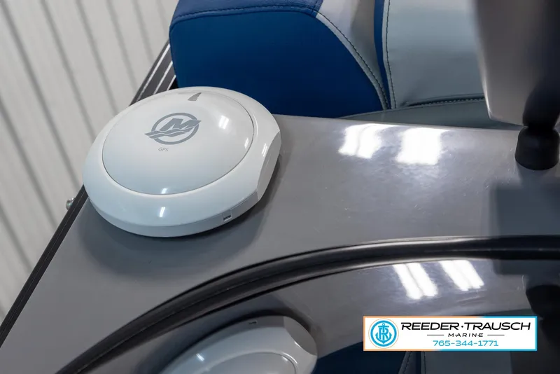 Slide: The Image of 2023 Avalon Waketoon boat interior with Reeder Trausch Marine branding. - 44