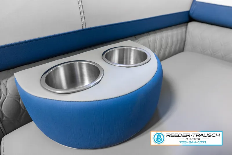 Slide: The Image of 2023 Avalon Waketoon boat interior with blue and gray cup holders by Reeder Trausch Marine. - 47