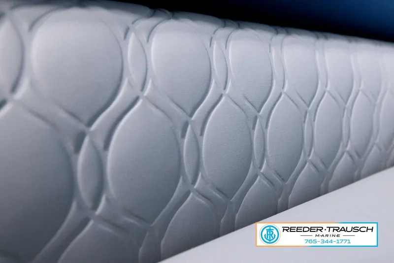 Slide: The Image of Close-up of 2023 Avalon Waketoon boat upholstery with textured pattern. - 49