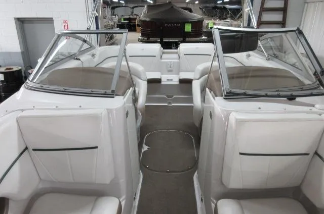 Slide: The Image of 2007 Four Winns 220 Horizon boat interior with seating and windshield. - 7