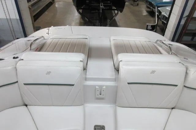 Slide: The Image of 2007 Four Winns 220 Horizon boat interior with white leather seats. - 9