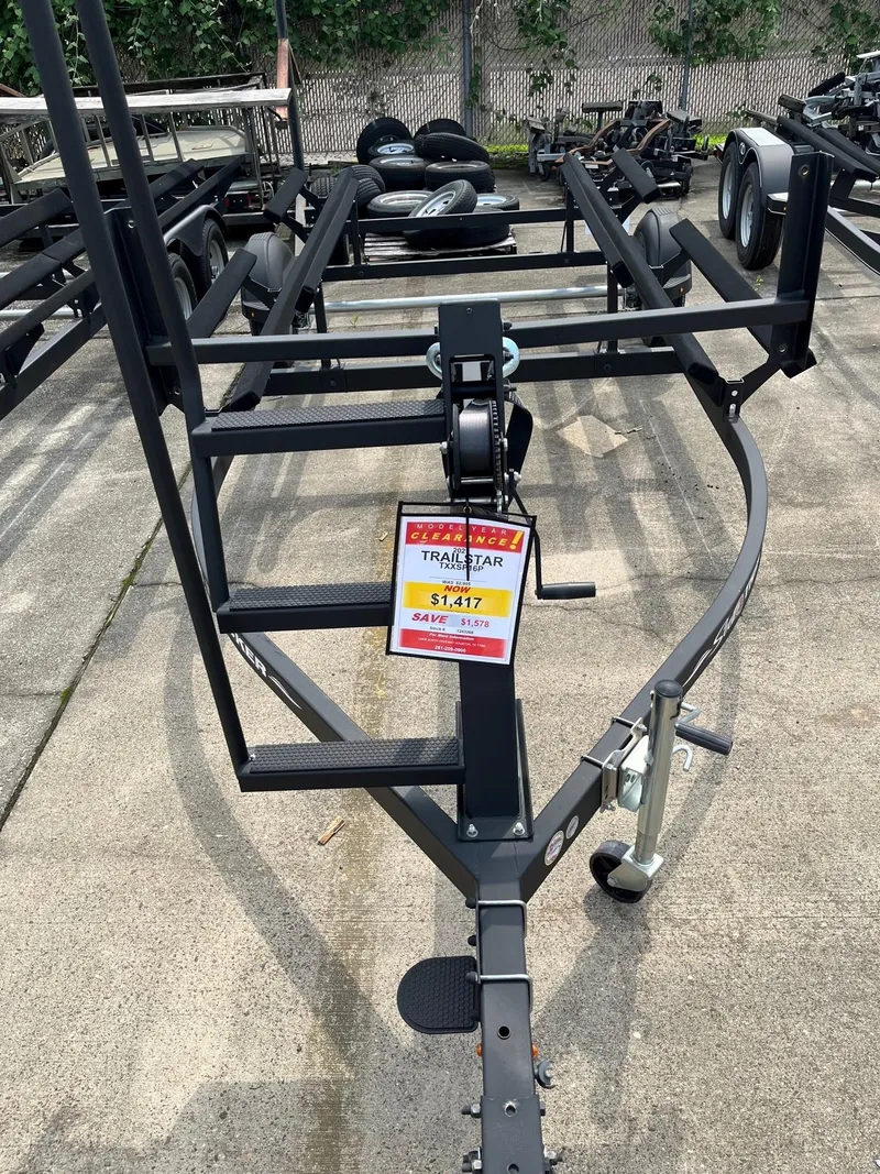Slide: The Image of 2021 Trailstar trailer for sale, displayed in a lot with other trailers. - 1
