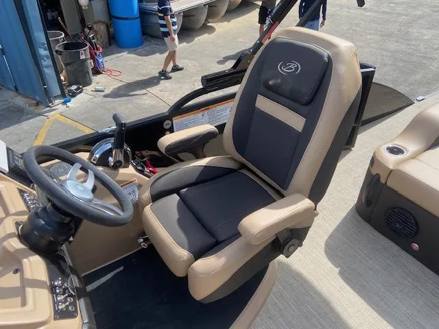 Slide: The Image of 2023 Barletta Cabrio C22U captain's chair and helm station. - 14
