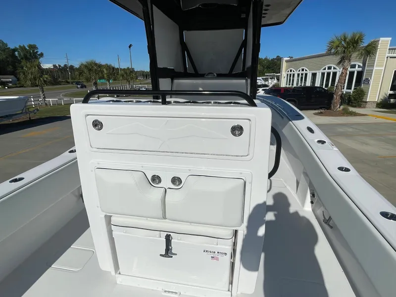 Slide: The Image of 2024 Invincible 33 Open Fisherman boat interior with seating and storage compartments. - 10