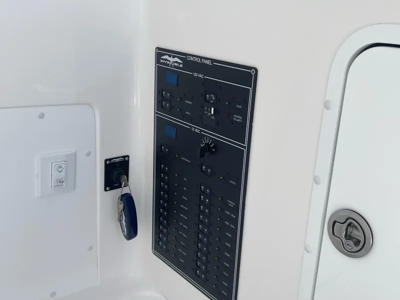 Slide: The Image of Control panel of the 2024 Invincible 33 Open Fisherman boat. - 34