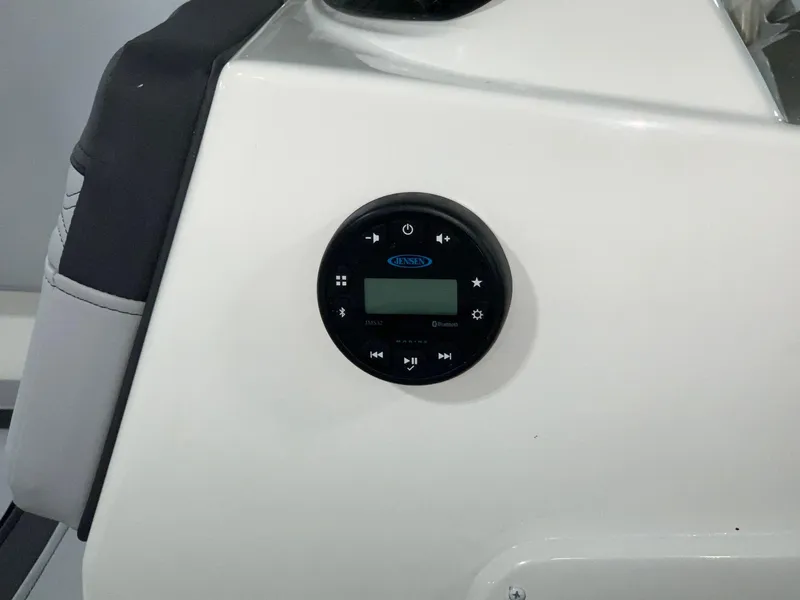 Slide: The Image of 2024 Bayliner Element M15 boat dashboard with control panel. - 6