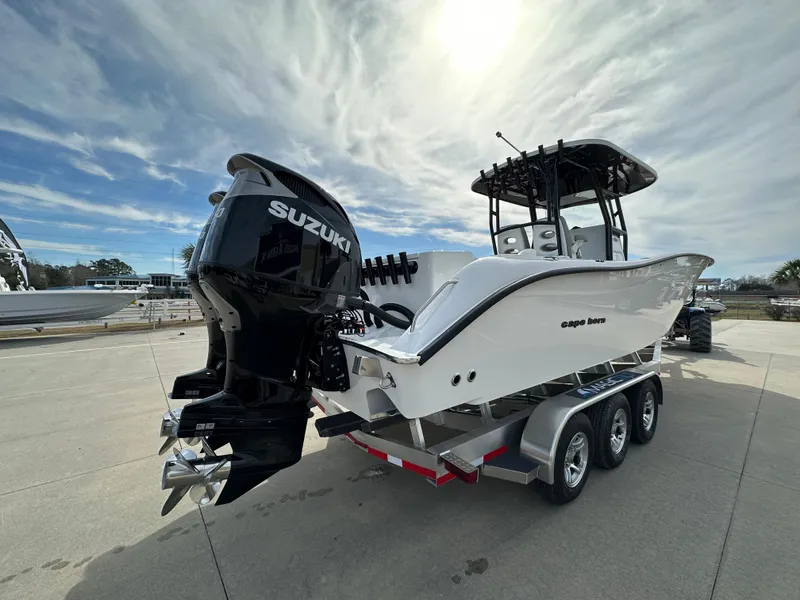 Slide: The Image of 2024 Cape Horn 32 XS boat with Suzuki outboard engines on a trailer. - 4