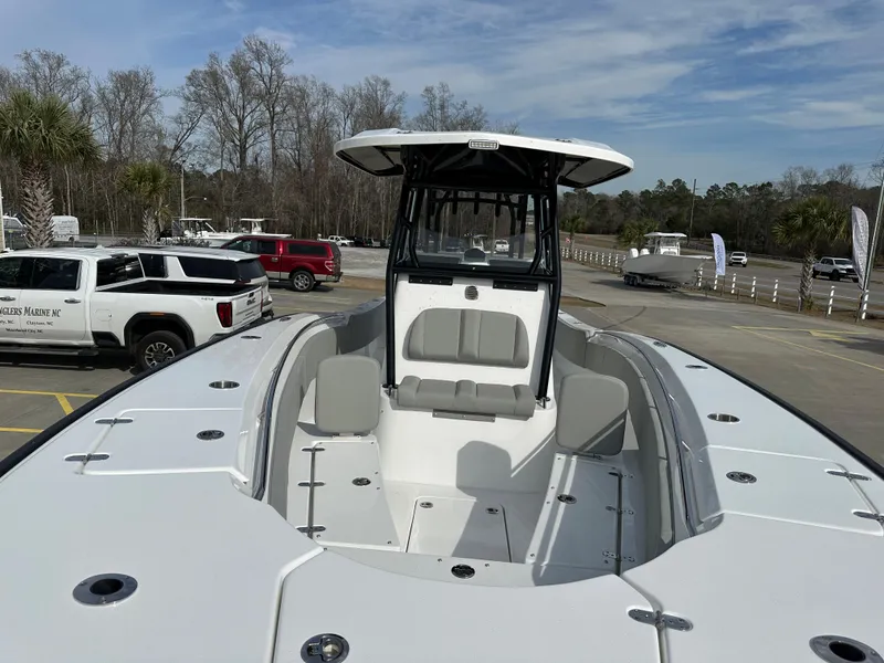 Slide: The Image of 2024 Cape Horn 32 XS boat with spacious seating and modern design. - 8