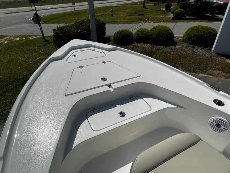 Slide: The Image of 2024 Key West 188 Bay Reef boat bow with storage compartments. - 4