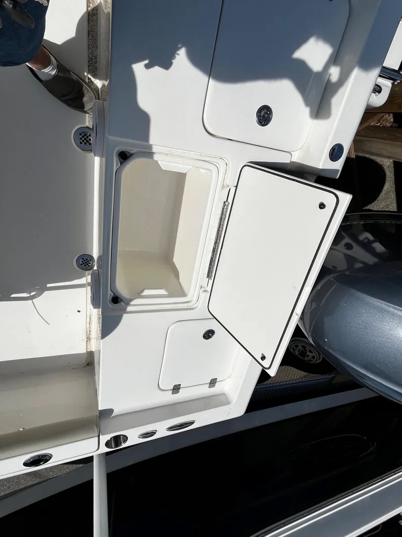 Slide: The Image of 2024 Key West 188 Bay Reef boat with open storage compartment. - 7