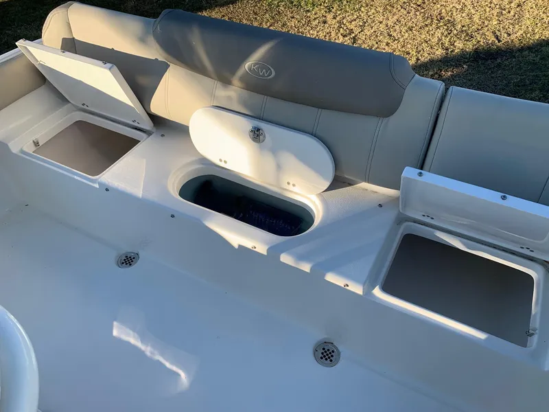 Slide: The Image of 2024 Key West 219 FS boat seating and storage compartments. - 10