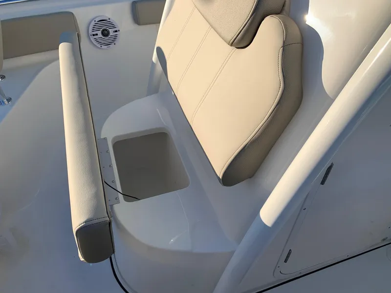 Slide: The Image of 2024 Key West 219 FS boat seat with storage compartment. - 17