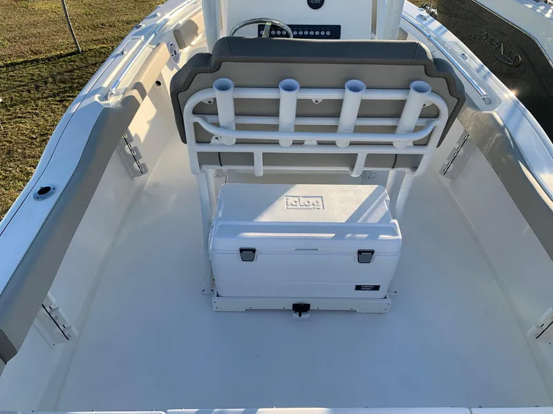 Slide: The Image of 2024 Key West 219 FS boat interior with seating and storage. - 7