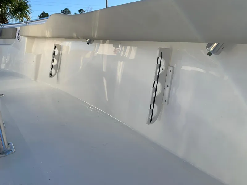 Slide: The Image of 2024 Key West 239 FS boat interior side view with rod holders. - 10