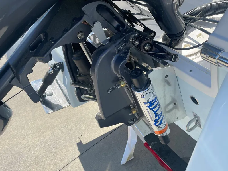 Slide: The Image of Close-up of the engine mount on a 2024 Robalo 226 Cayman boat. - 7