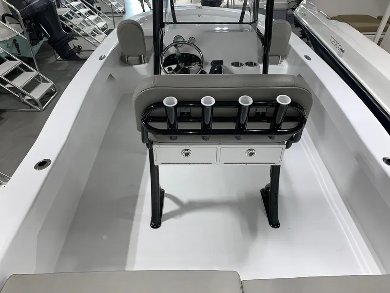 Slide: The Image of 2024 Savannah SS21 boat interior with seating, rod holders, and storage drawers. - 3