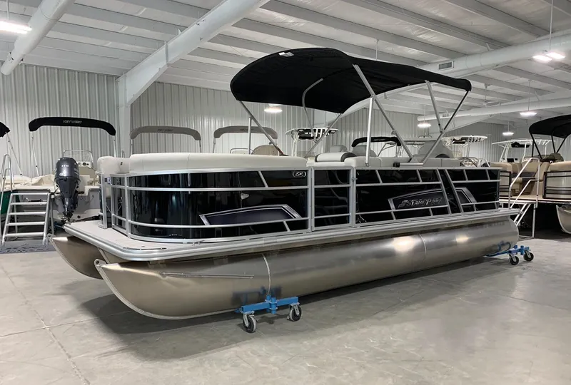 The Image of 2024 Starcraft EX22 FD pontoon boat in showroom. - 0