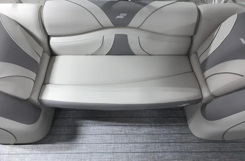 Slide: The Image of 2024 Starcraft EX22 FD boat seating with gray and white upholstery. - 9