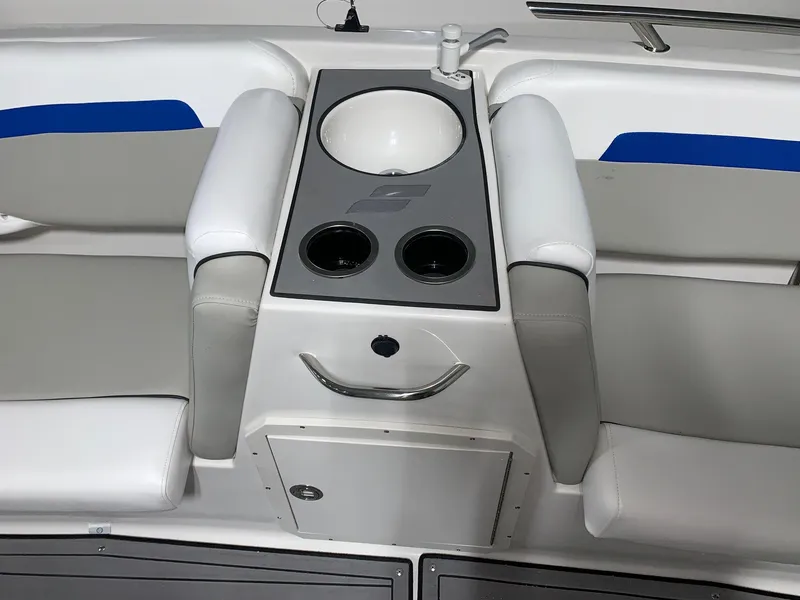 Slide: The Image of 2024 Starcraft SVX 191 boat interior with seating and cup holders. - 10