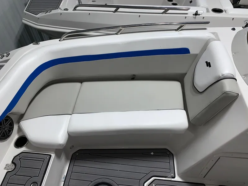 Slide: The Image of 2024 Starcraft SVX 191 boat interior seating with blue accent. - 5