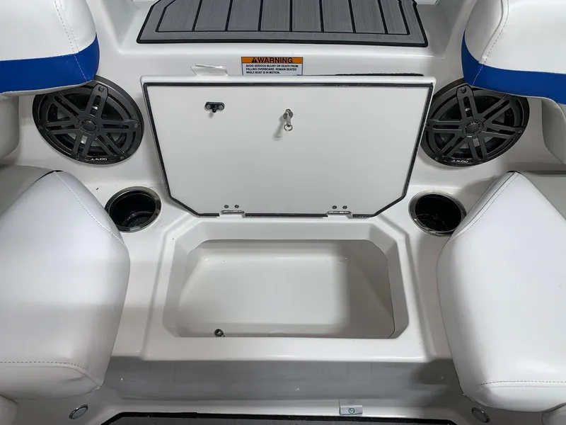Slide: The Image of 2024 Starcraft SVX 191 boat interior with storage compartment and speakers. - 6