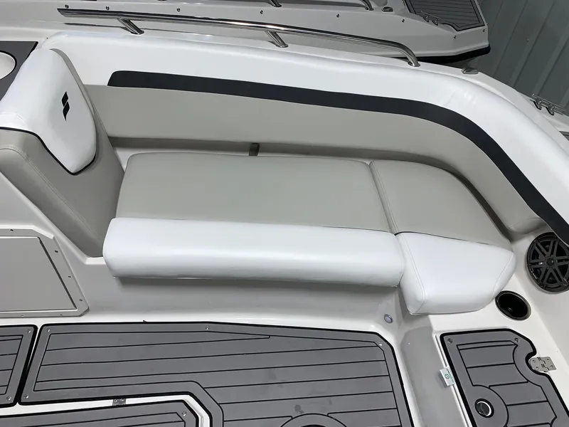 Slide: The Image of 2024 Starcraft SVX 191 boat interior seating with gray and white upholstery. - 7