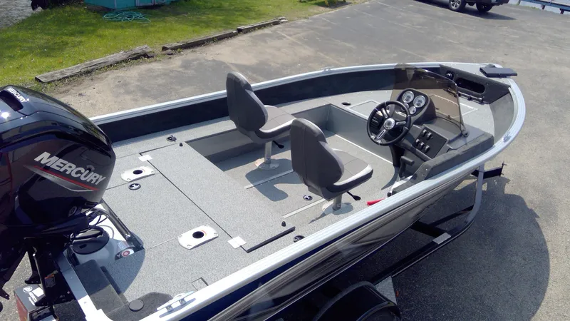 Slide: The Image of 2023 Starcraft Stealth 166 SC fishing boat with Mercury outboard motor. - 6