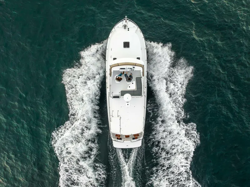 Slide: The Image of Aerial view of 2024 Nordic Tug 40 cruising on open water. - 3