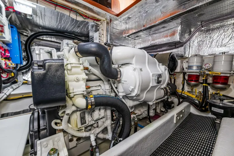 Slide: The Image of 2024 Nordic Tug 40 engine room with advanced machinery and insulation. - 33
