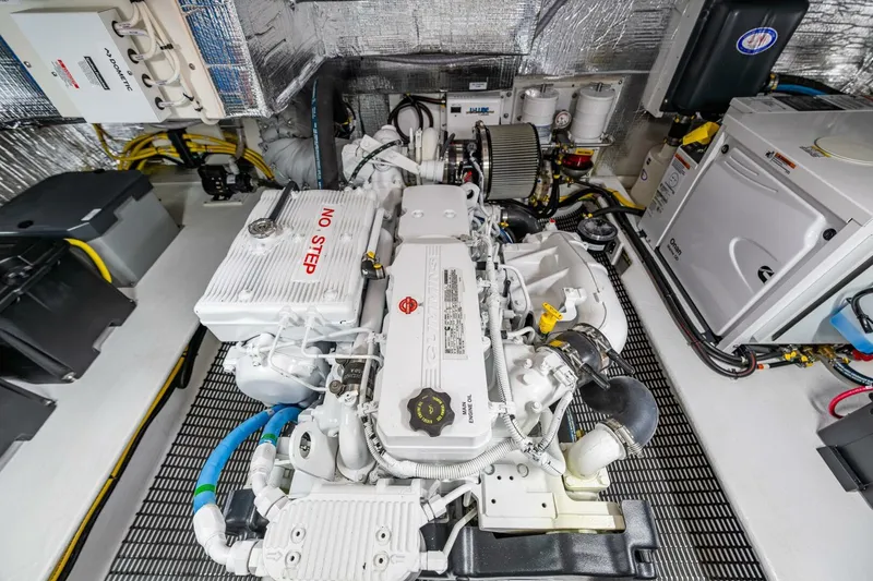 Slide: The Image of Engine room of 2024 Nordic Tug 40, showcasing advanced marine engine and components. - 38