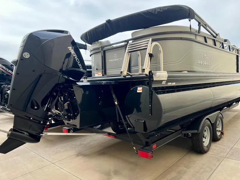 Slide: The Image of 2023 Regency 230 DL3 pontoon boat with Mercury outboard motor. - 4