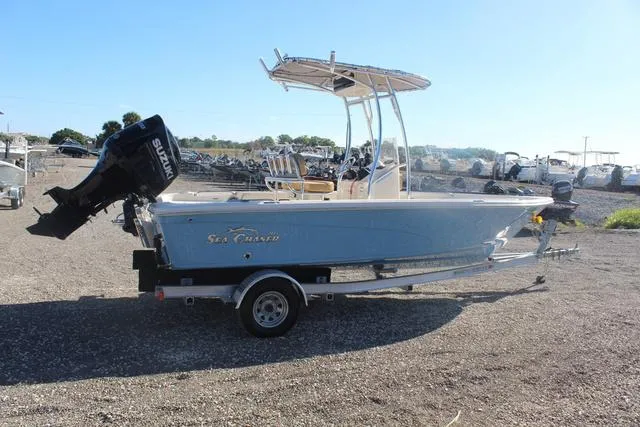 Slide: The Image of 2023 Sea Chaser 21 LX boat on trailer with outboard motor. - 13