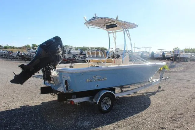 Slide: The Image of 2023 Sea Chaser 21 LX boat on trailer with outboard motor. - 14