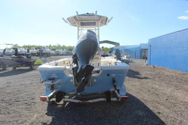 Slide: The Image of 2023 Sea Chaser 21 LX boat with Suzuki outboard motor on trailer. - 17