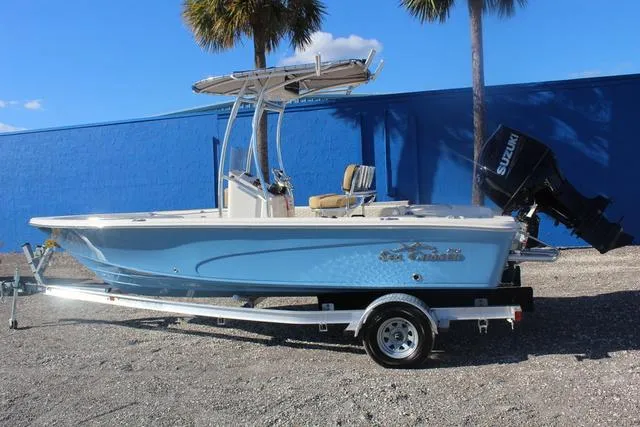 Slide: The Image of 2023 Sea Chaser 21 LX boat interior with console and seating. - 20