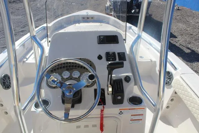 Slide: The Image of 2023 Sea Chaser 21 LX boat console with T-top and storage compartment. - 29